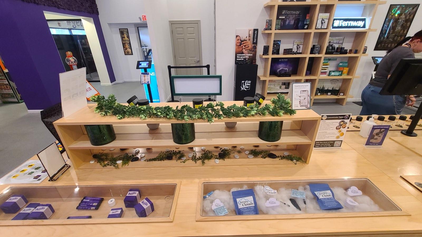 Cannabis products in display cases and shelving at ANJA in Highland Park, NJ